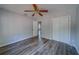Spacious bedroom with hardwood floors, ample closet space, and neutral paint at 2340 Kingston S St, St Petersburg, FL 33711