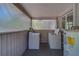 Enclosed laundry room with appliances and window at 2340 Kingston S St, St Petersburg, FL 33711