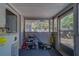 Enclosed area for storage and laundry with convenient access to the backyard at 2340 Kingston S St, St Petersburg, FL 33711
