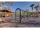 Playground area with swings and slides plus sun shade at 31707 Holcomb Pass, Wesley Chapel, FL 33543