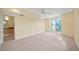 Spacious bedroom with neutral carpet, ceiling fan and plenty of natural light at 3405 W Swann Ave # 9, Tampa, FL 33609