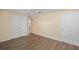 Spacious bedroom featuring tile floors, closet space, and access to another room at 3405 W Swann Ave # 9, Tampa, FL 33609