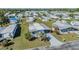 Bird's eye view of quaint single-story home in a mobile home community at 37235 Cora Ave, Zephyrhills, FL 33542