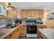 Well-equipped kitchen with modern appliances and ample counter space for meal preparation at 37235 Cora Ave, Zephyrhills, FL 33542