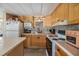 Efficient kitchen featuring modern appliances, good lighting, and plenty of storage space at 37235 Cora Ave, Zephyrhills, FL 33542