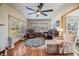 Inviting living room with plenty of seating and natural light at 37235 Cora Ave, Zephyrhills, FL 33542