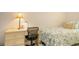 Cozy bedroom featuring a work desk, chair, and a comfortably made twin bed at 440 Pendleton Dr, Venice, FL 34292