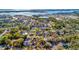 Aerial view of neighborhood, showcasing proximity to water and lush landscaping at 4962 112Th N St, St Petersburg, FL 33708