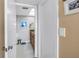Neutral bathroom with tile floors, vanity, and skylight at 5220 Brittany S Dr # 1403, St Petersburg, FL 33715