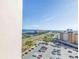 Picturesque coastal view from a condo featuring lush landscaping and waterfront properties under a clear sky at 5220 Brittany S Dr # 1403, St Petersburg, FL 33715