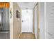 Bright hallway with stainless steel appliances, in-unit laundry and a large storage closet at 5220 Brittany S Dr # 1403, St Petersburg, FL 33715