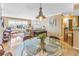 Inviting living room area boasting lots of natural light and an open-concept floorplan to the kitchen at 5220 Brittany S Dr # 1403, St Petersburg, FL 33715