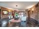 Lobby with slate floors, exposed brick walls, and waiting area at 5220 Brittany S Dr # 1403, St Petersburg, FL 33715