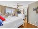 Comfortable main bedroom with city views, a dresser, and access to the living room at 5220 Brittany S Dr # 1403, St Petersburg, FL 33715