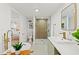 Elegant bathroom showcasing a soaking tub, glass-enclosed shower, and modern fixtures for a luxurious experience at 5314 13Th S Ave, Gulfport, FL 33707