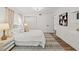 Comfortable bedroom with a queen-sized bed, plush bedding, and modern decor creating a relaxing and stylish space at 5314 13Th S Ave, Gulfport, FL 33707