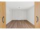 Empty bedroom showcasing modern flooring and plenty of closet space at 5314 13Th S Ave, Gulfport, FL 33707