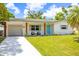 Charming single-story home with a well-maintained lawn and inviting curb appeal at 5314 13Th S Ave, Gulfport, FL 33707