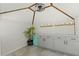 Pool house featuring grey cabinets, mini fridge and floating shelves for storage at 5314 13Th S Ave, Gulfport, FL 33707