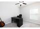 Office space with soft gray carpet, desk, and a window at 5412 Olano St, Palmetto, FL 34221