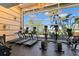 Bright gym with state-of-the-art equipment and large windows providing picturesque outdoor views at 545 Bahia Beach Blvd, Ruskin, FL 33570