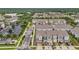 Aerial view of the townhome community with well-manicured landscaping and parking at 5728 Skytop Dr, Lithia, FL 33547