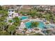 Aerial view of the community pool and neighborhood with lush landscaping at 5728 Skytop Dr, Lithia, FL 33547