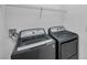 Functional laundry room equipped with a washer and dryer at 5728 Skytop Dr, Lithia, FL 33547