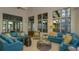 Comfortable community lounge featuring large windows and comfortable seating at 5728 Skytop Dr, Lithia, FL 33547