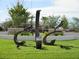Unique community sculpture graces the lawn, creating an inviting space at 5728 Skytop Dr, Lithia, FL 33547