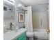 Cozy bathroom with a shower and tub and unique bowl sink at 5840 30Th S Ave # 305, Gulfport, FL 33707