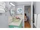 Bathroom featuring bright vanity with a glass vessel sink and a view to a bedroom at 5840 30Th S Ave # 305, Gulfport, FL 33707