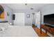 Cozy bedroom features hardwood floors, ceiling fan, and spacious closet at 5840 30Th S Ave # 305, Gulfport, FL 33707