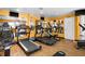 Bright gym with exercise equipment, mirrored walls, and motivational quote at 5840 30Th S Ave # 305, Gulfport, FL 33707