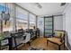Bright home office with natural light, a ceiling fan, and sliding glass door at 5840 30Th S Ave # 305, Gulfport, FL 33707