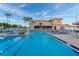 Stunning community pool area with lounge chairs and lush landscaping at 5840 30Th S Ave # 305, Gulfport, FL 33707