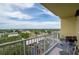Open air balcony with a small table and chairs and a open view at 628 Cleveland St # 907, Clearwater, FL 33755