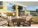 Inviting rooftop terrace featuring comfortable seating, outdoor kitchen, and relaxing lounge chairs at 628 Cleveland St # 907, Clearwater, FL 33755