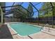 Private backyard swimming pool inside screened enclosure, with ladders and room for fun and exercise at 8329 Broken Willow Ln, Port Richey, FL 34668