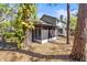 View of the screened porch with access to the lush backyard at 8409 Laurelon Pl # 8409, Temple Terrace, FL 33637