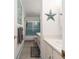 Bathroom featuring a shower-tub combination and vanity with counter space at 100 Bluff View Dr # 317A, Belleair Bluffs, FL 33770