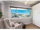Bright sitting area with comfortable armchairs and an exterior view at 100 Bluff View Dr # 317A, Belleair Bluffs, FL 33770