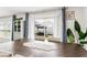Dining room with view of the backyard, showcasing the sliding glass doors and natural light at 10105 Paradise Fish Dr, Riverview, FL 33578