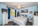 Nautical themed bedroom with queen sized bed at 1017 Jamaica Way, Tarpon Springs, FL 34689