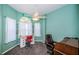 Bright bedroom with large window and desk space at 1017 Jamaica Way, Tarpon Springs, FL 34689