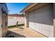 Attached garage providing secure parking and easy access to the home, complemented by a storage shed at 1017 Jamaica Way, Tarpon Springs, FL 34689