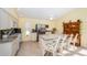 Spacious kitchen with stainless steel appliances, granite countertops, and a functional island at 1017 Jamaica Way, Tarpon Springs, FL 34689