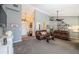 Spacious living room with high ceilings and brown leather couches, perfect for relaxation and entertaining guests at 1017 Jamaica Way, Tarpon Springs, FL 34689