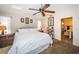 Spacious main bedroom with a large bed and decor at 1017 Jamaica Way, Tarpon Springs, FL 34689