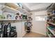 Walk-in pantry with extensive shelving for maximum storage at 1017 Jamaica Way, Tarpon Springs, FL 34689